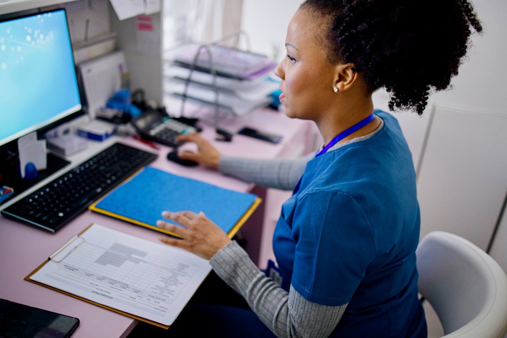 Medical office worker working